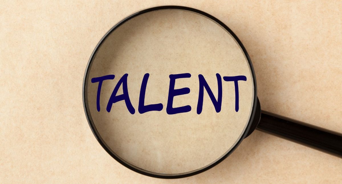 talent development strategy talent writing seen with a magnifying glass